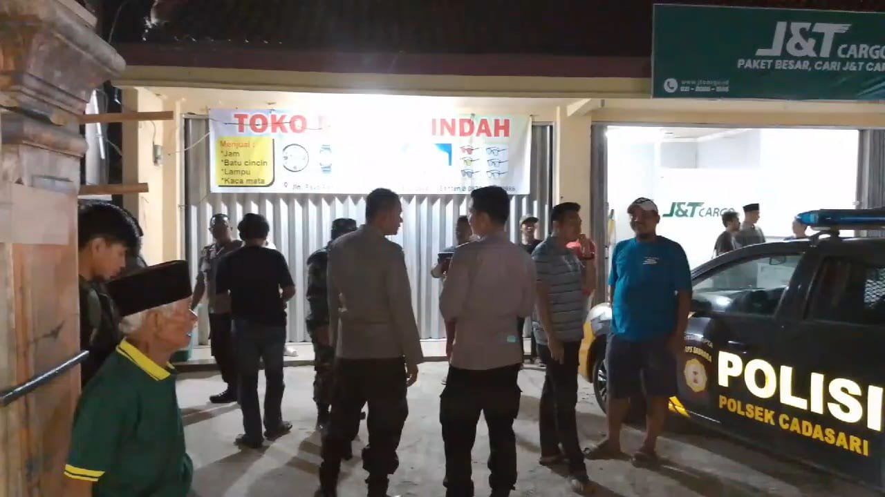 Pemilik Toko Jam